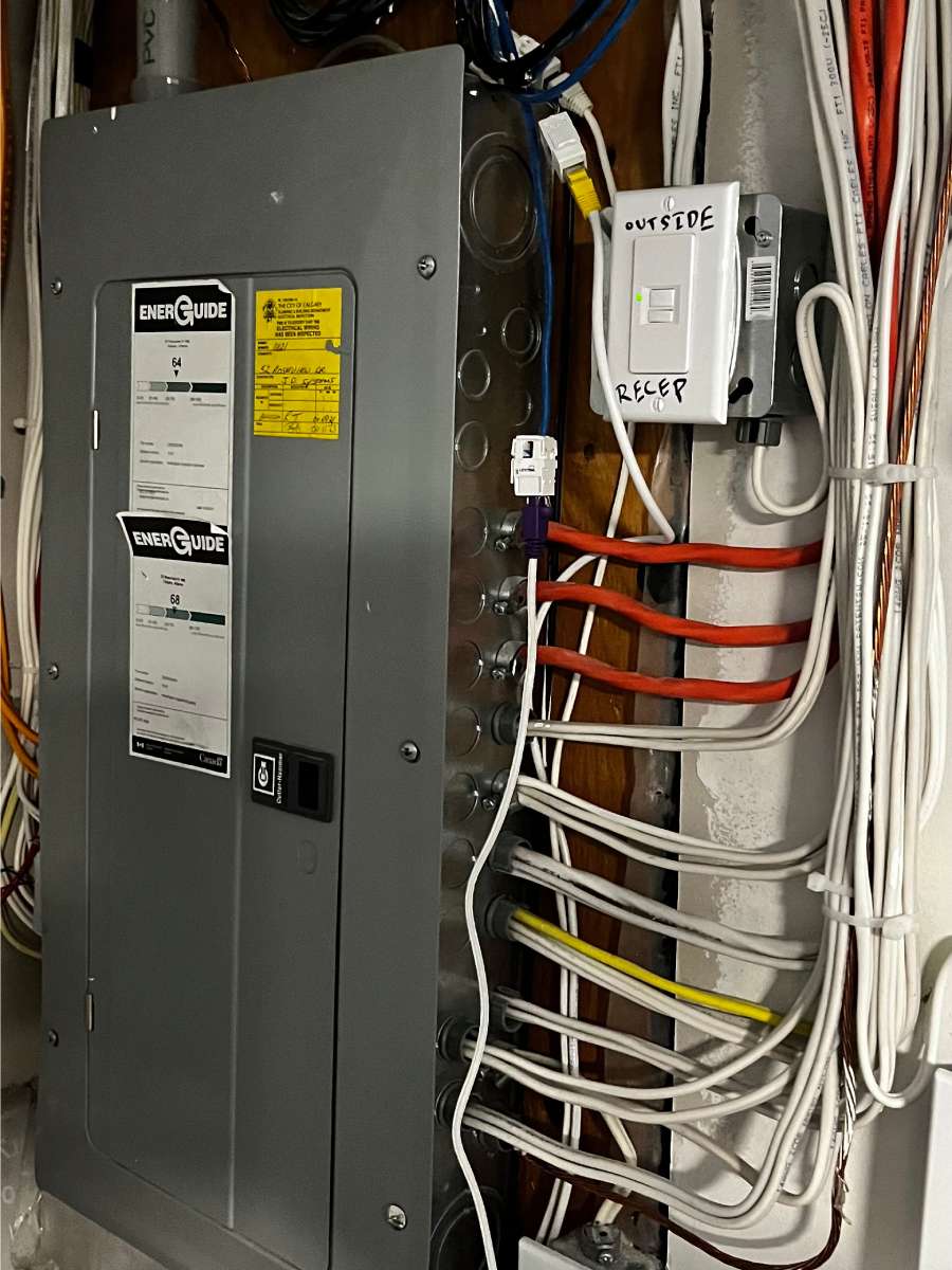 an electrical panel with multiple wires attached