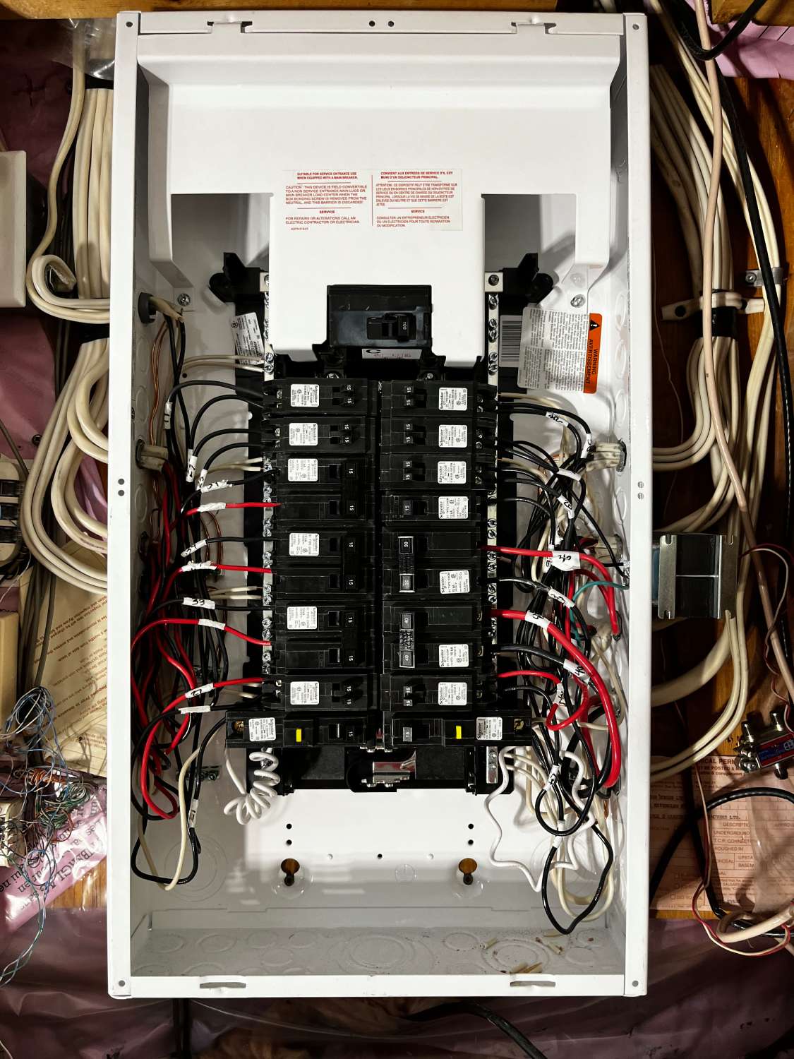 an electrical 100 amp panel with multiple wires