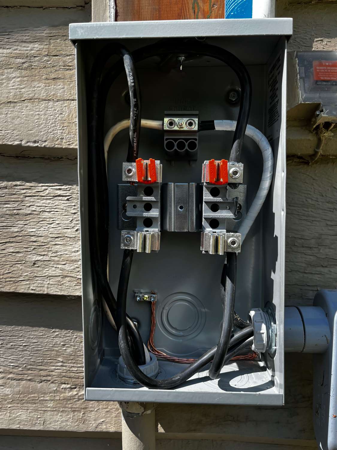 an electrical box with multiple wires attached to it