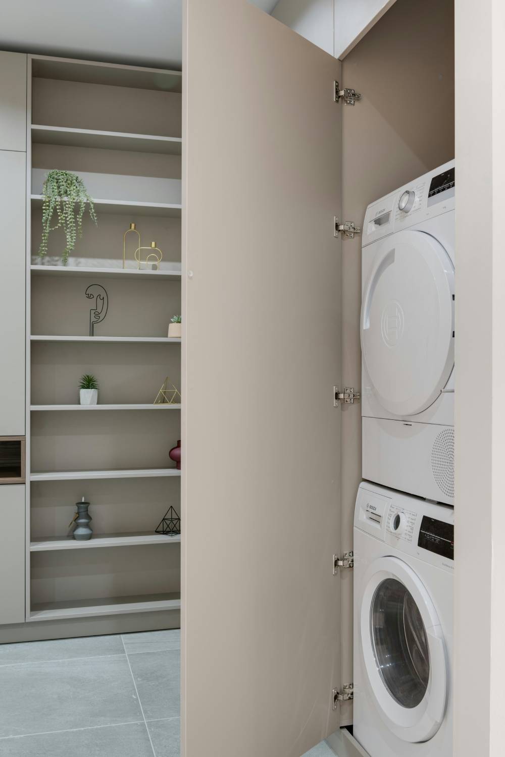 a dryer stacked on top of a washer